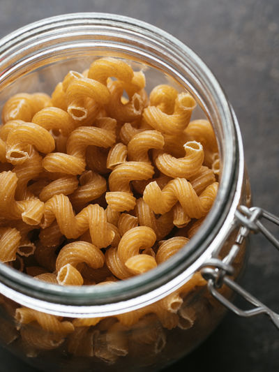 High angle view of pasta in container on table