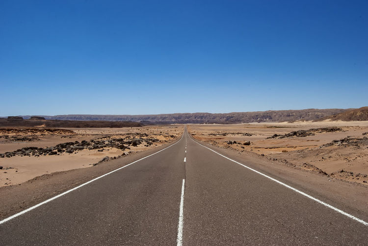 View of empty road against clear sky