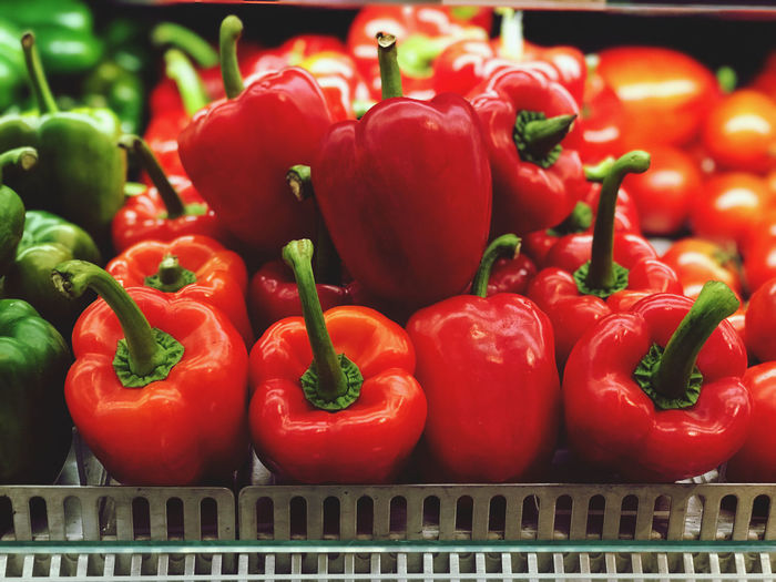 Close-up of red bell peppers for sale in market