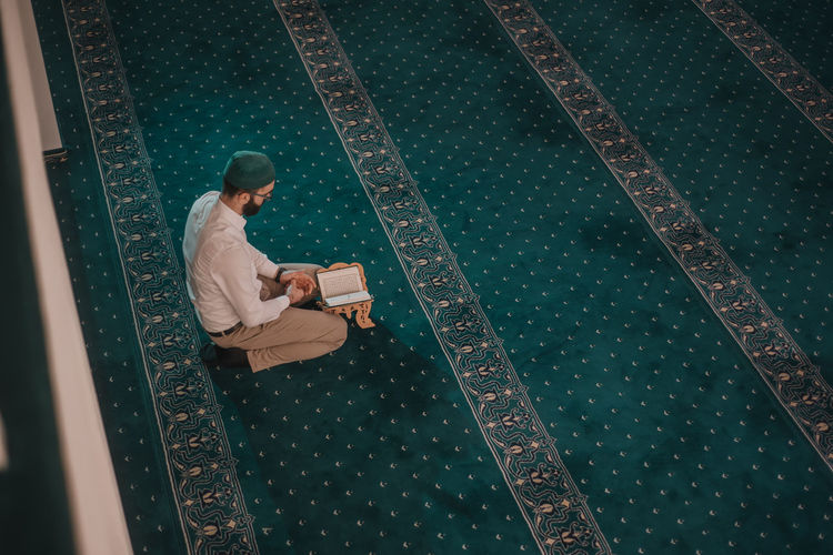 High angle view of man using mobile phone