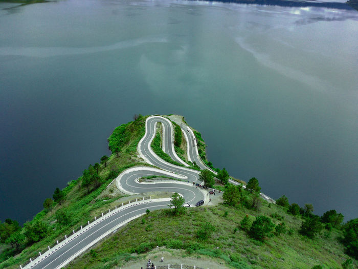High angle view of road by lake