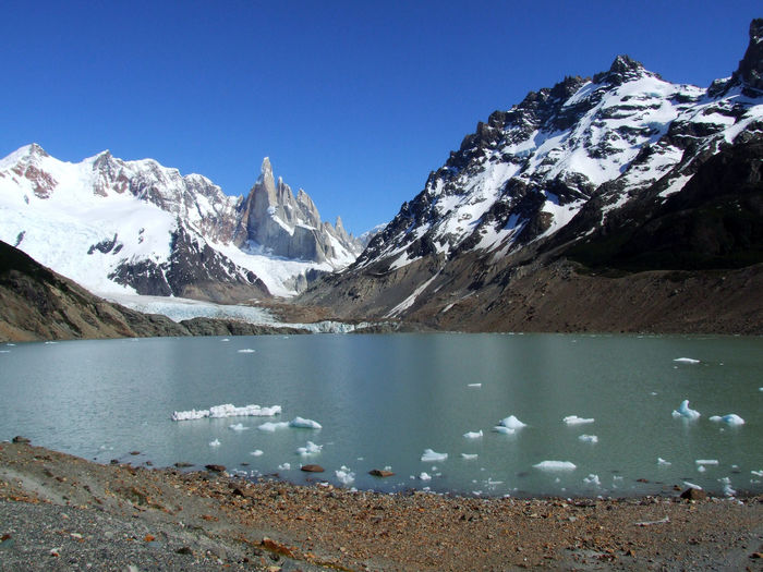 Cerro torre mountain range with glacier lake and icebergs, patagonia, argentina