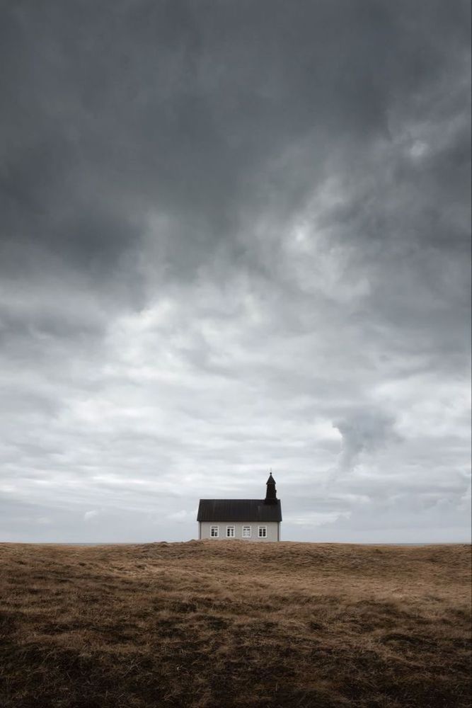 cloud, horizon, sky, environment, landscape, land, nature, architecture, storm, built structure, plain, prairie, overcast, building, building exterior, no people, field, scenics - nature, outdoors, storm cloud, day, cloudscape, wind, morning, dramatic sky, rural scene, grass, beauty in nature, sea, tranquility, remote, horizon over land, darkness
