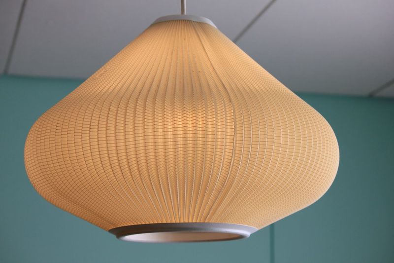 Low angle view of illuminated lamp at home