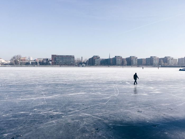 Man walking on ice rink