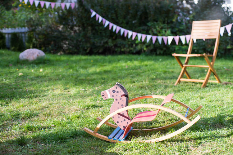 Chair and child rocking chair at a birthday party