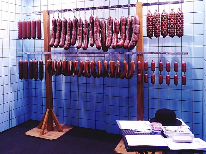 Sausages hanging at butcher shop