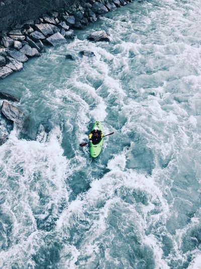 High angle view of man kayaking in river