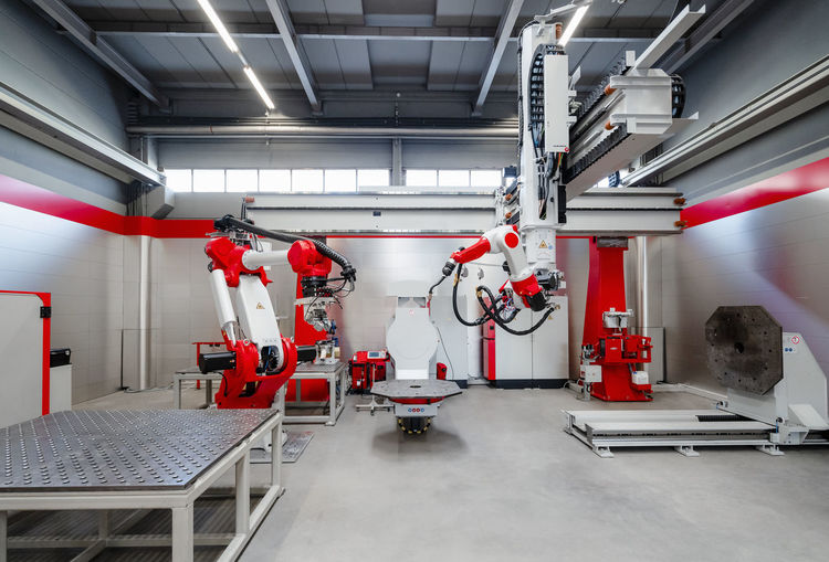 Automatic industrial robots for welding at factory
