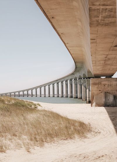 Bridge - Man Made Structure Architectural Column Clear Sky Sand Beach Business Finance And Industry Architecture Built Structure Sky The Architect - 2018 EyeEm Awards