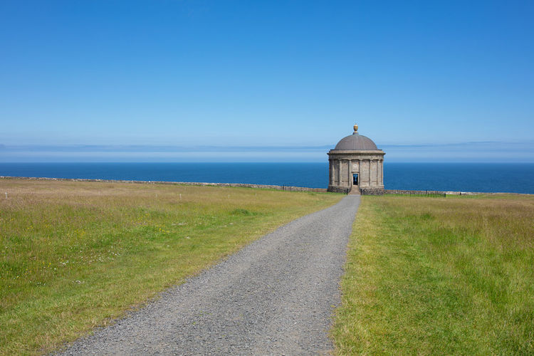 Mussenden temple against blue sky  on the north-western coastline of northern ireland