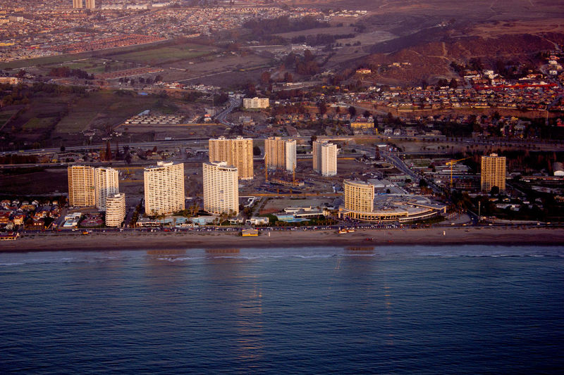 Aerial view of coquimbo cityscape by sea
