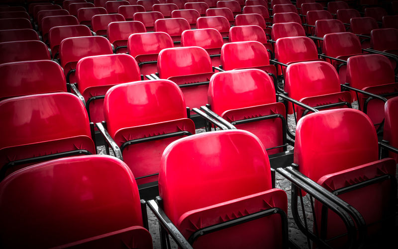 Full frame shot of empty red chairs