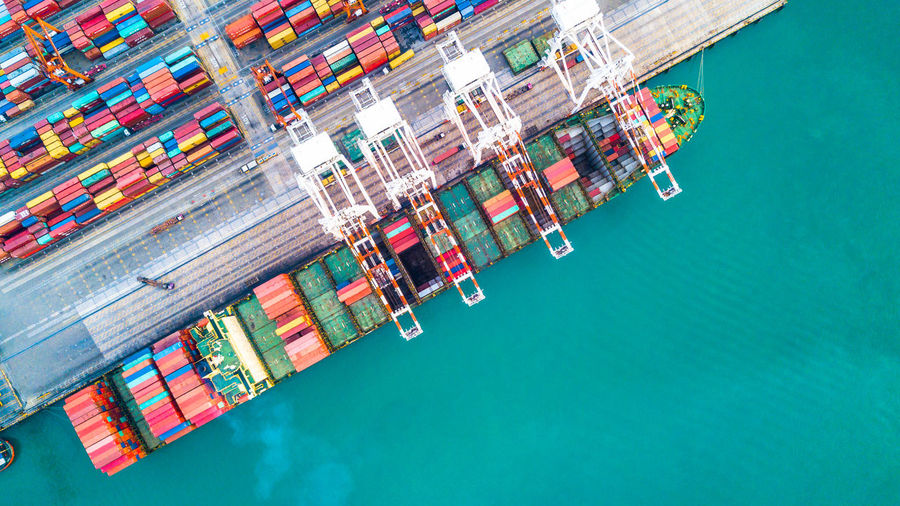 High angle view of container ship at commercial dock