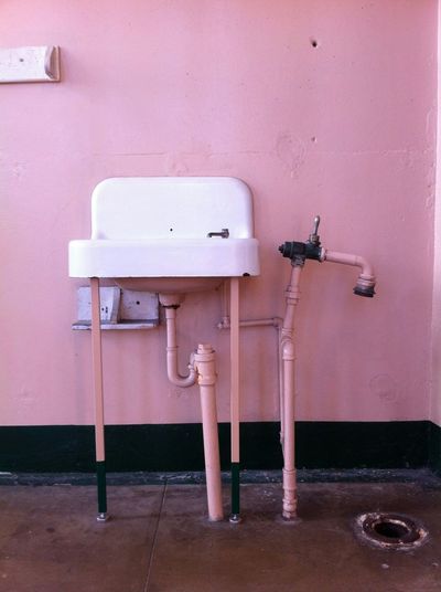 Sink and pipes in prison cell at alcatraz island