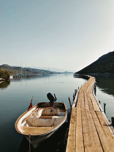 Pier over lake with boat 