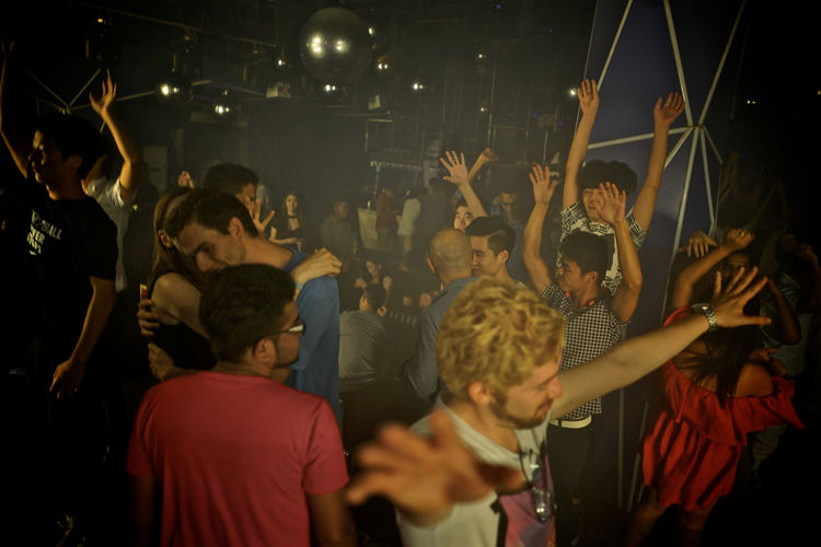 People dancing in nightclub