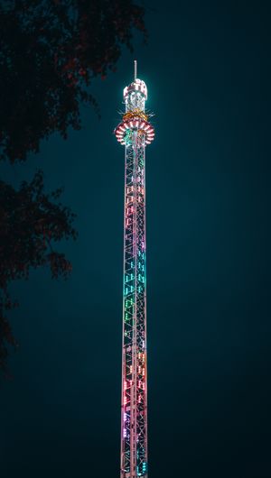 Low angle view of illuminated ferris wheel