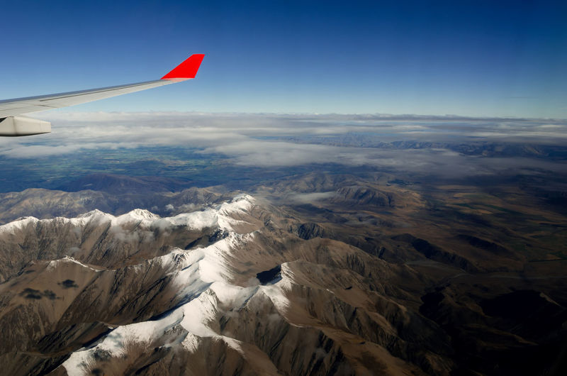 Aerial view of landscape and mountains against sky