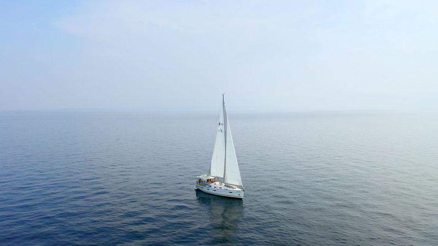 Sailing yacht in the sea. beautiful aerial drone shot.