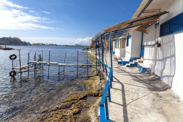 Panoramic view of pier by sea against sky