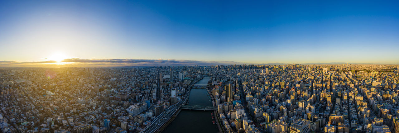 High angle view of cityscape against sky during sunset