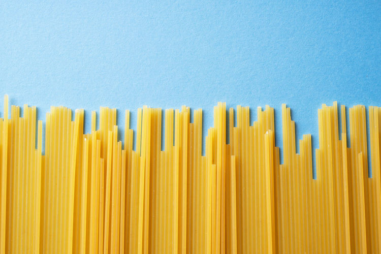 Close-up of fresh orange over white background