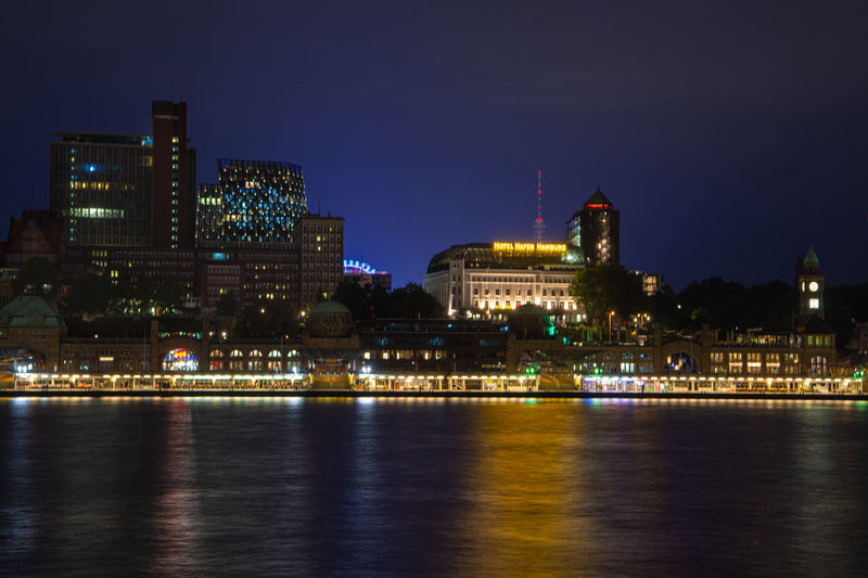 Illuminated buildings in city at night