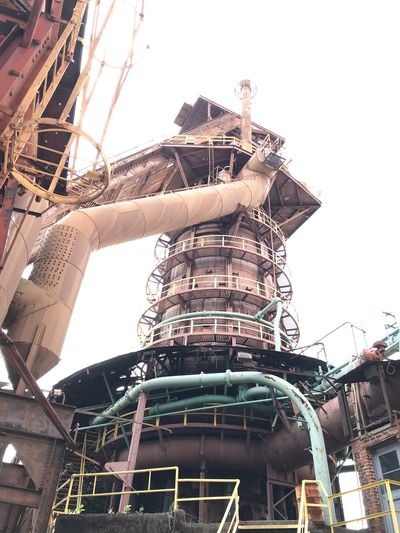Low angle view of construction site against sky