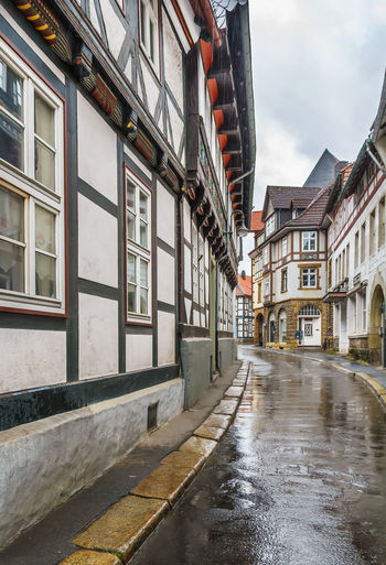 Street with old decorative houses in goslar, germany