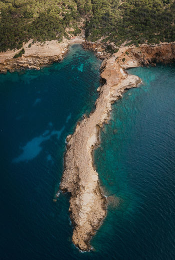 High angle view of rocky coast 
