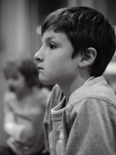 Close-up of boy looking away