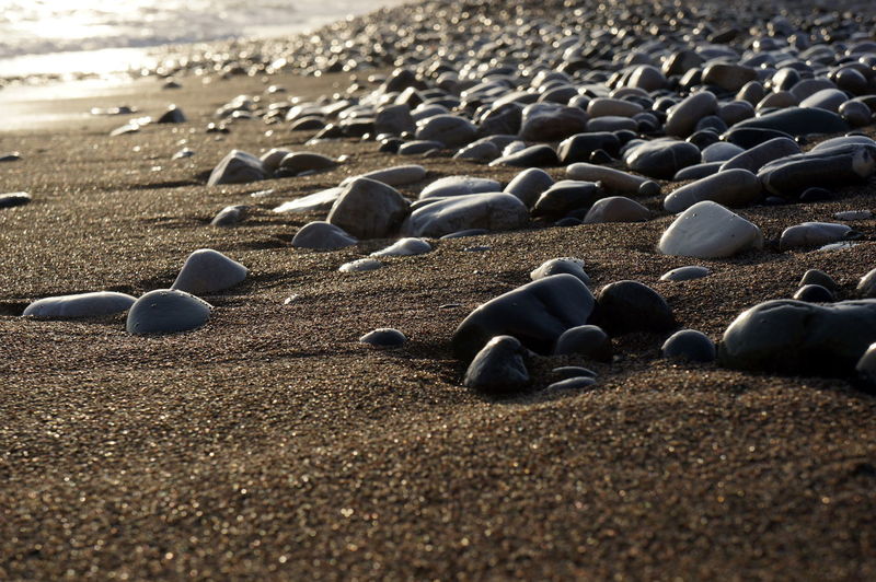 Stones on shore at beach