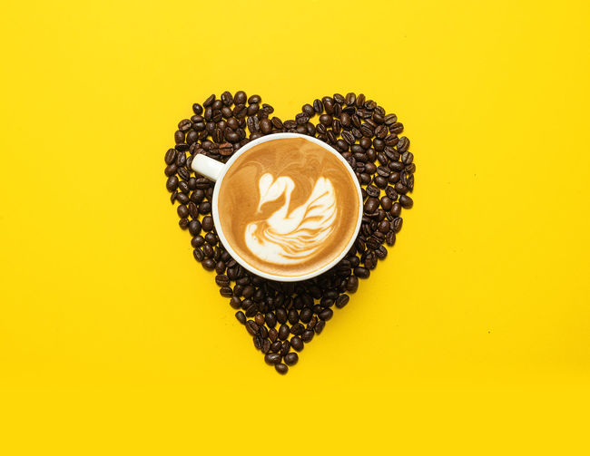 Heart shape made of coffee cup
