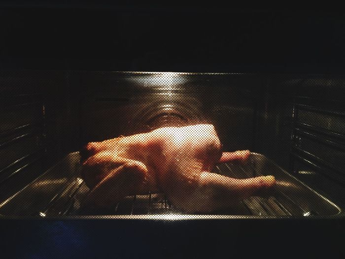 Chicken roasting in oven