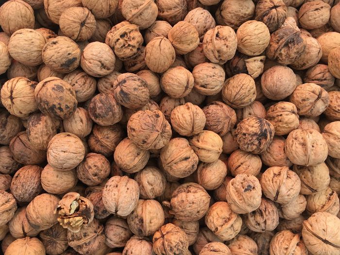 Full frame shot of walnuts for sale at market