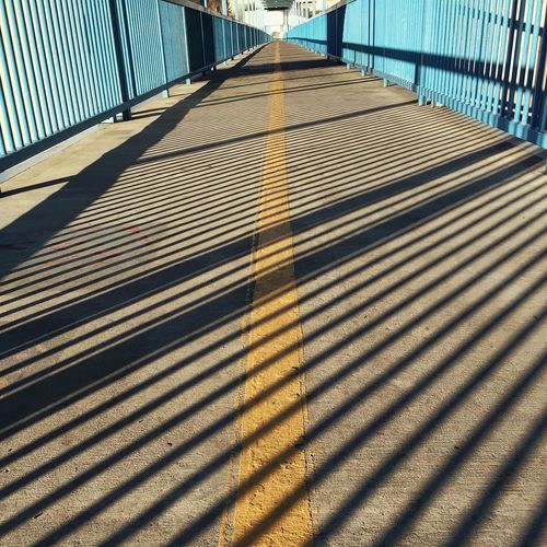Shadow on bridge