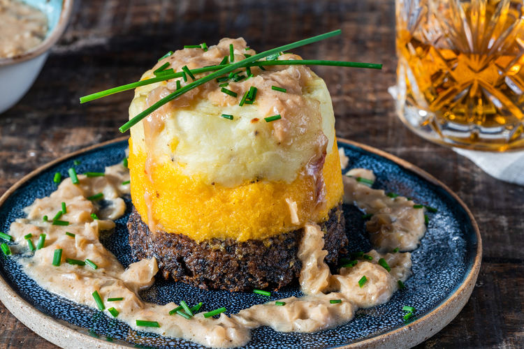 Haggis, neeps and tatties, haggis, turnips and potatoes, with whisky sauce,scottish burns night dish