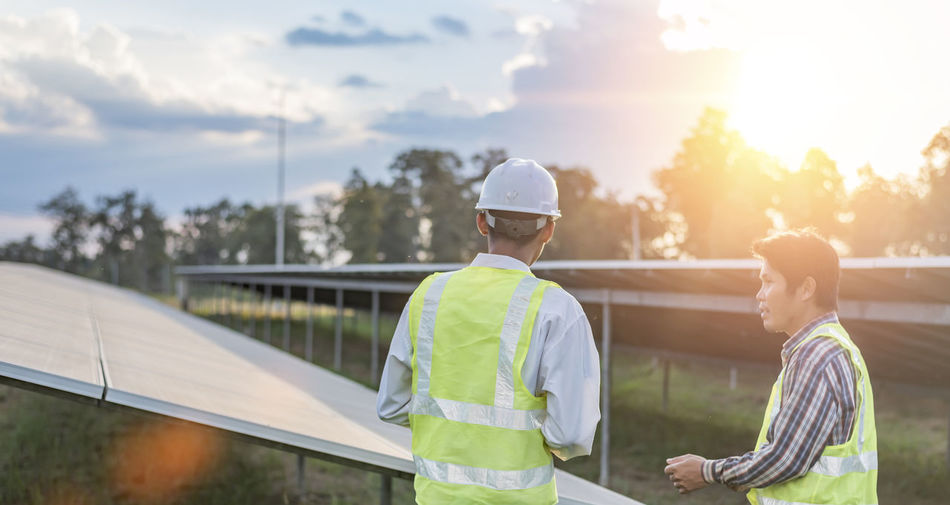 Engineers inspect and maintain solar power plants.  green energy innovation for life