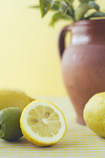 Close-up of lemons on table