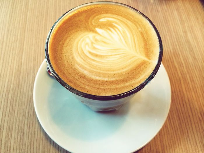 High angle view of cappuccino on table