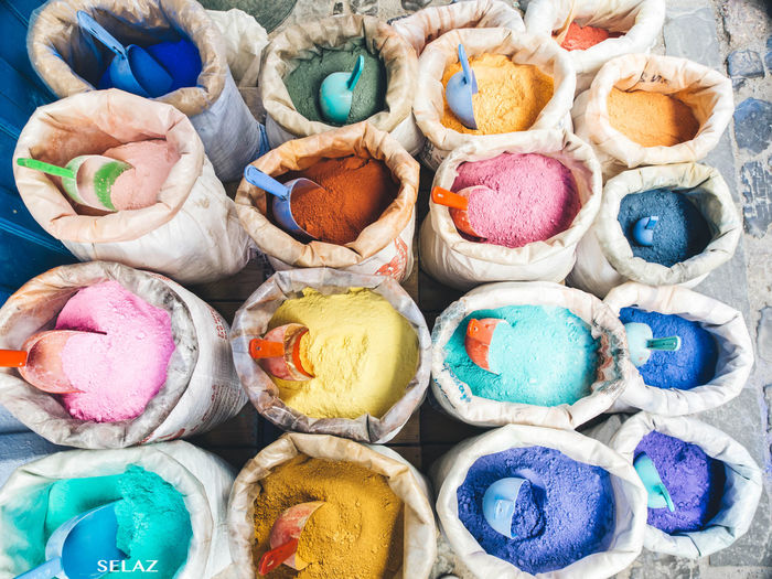 High angle view of multi colored paints