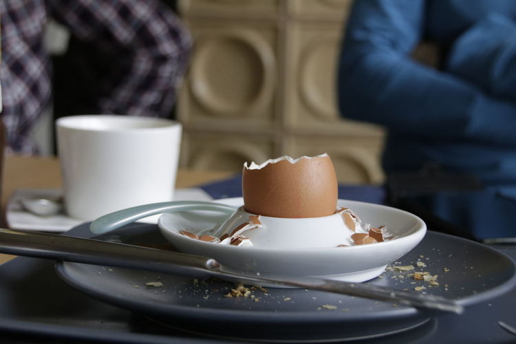 Close-up of coffee cup on table