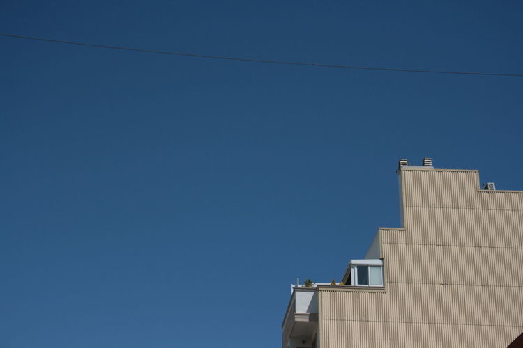Low angle view of building against clear sky