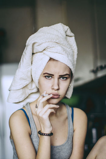 Bed Blanket Close-up Confidence Contemplation Cute Front View Happiness Home Interior Indoors Looking At Camera Lying Down Person Portrait Real People Relaxation Resting Serious