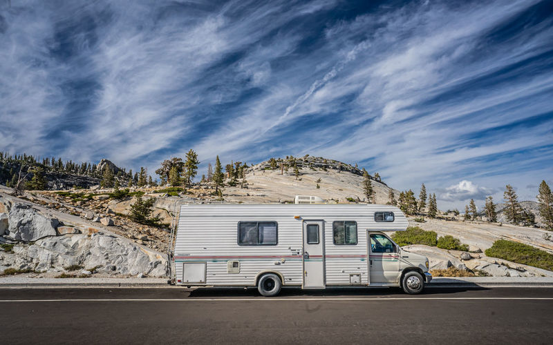 View of motor van on road against sky