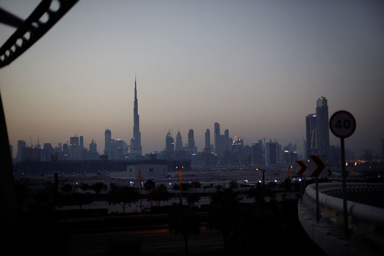 Dubai, uae, may 2021, view from the maidan bridge to dubai at dusk without lights