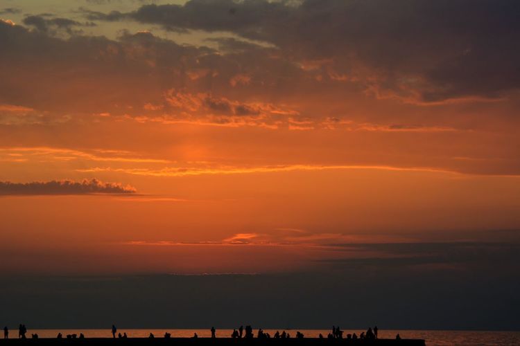 Scenic view of dramatic sky during sunset