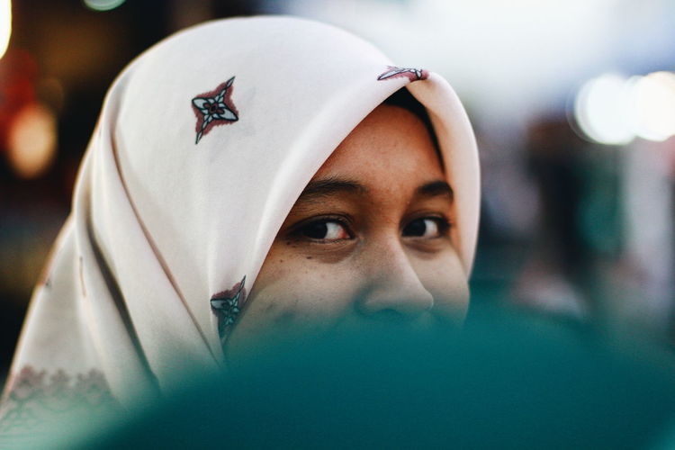 Close-up portrait of woman wearing hijab