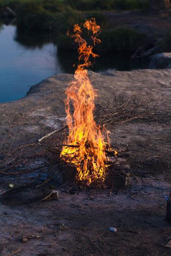 Bonfire in lakeside camping
